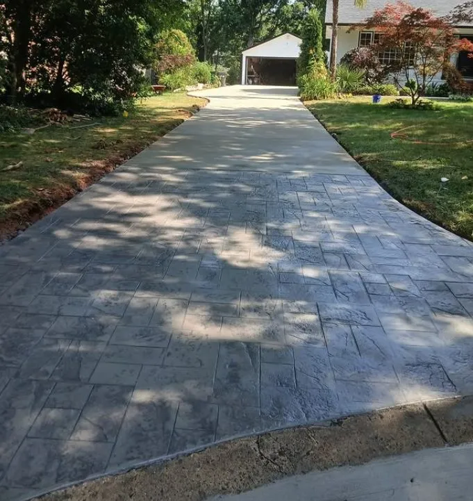 Stamped concrete driveway with a dark border